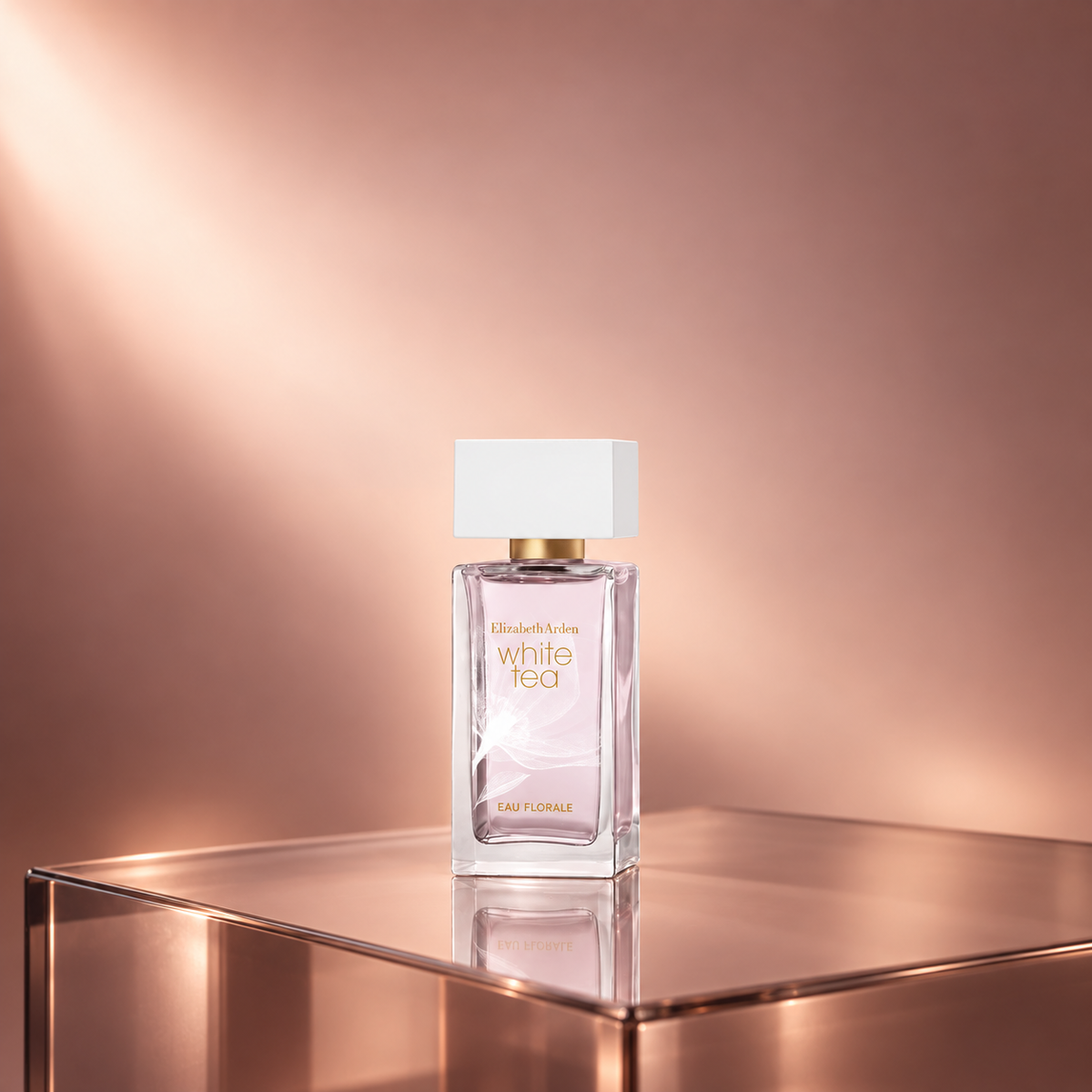 Elizabeth Arden White Tea Eau Florale Eau de Toilette 50ml bottle on a rose-gold glass pedestal