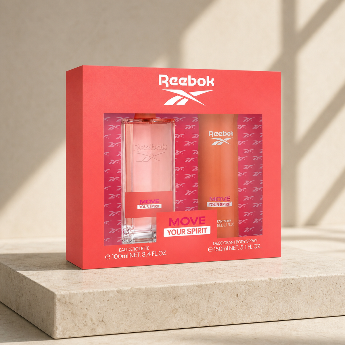Reebok Move Your Spirit Women EDT 100ml and body spray 150ml gift set in a sunlit travertine setting