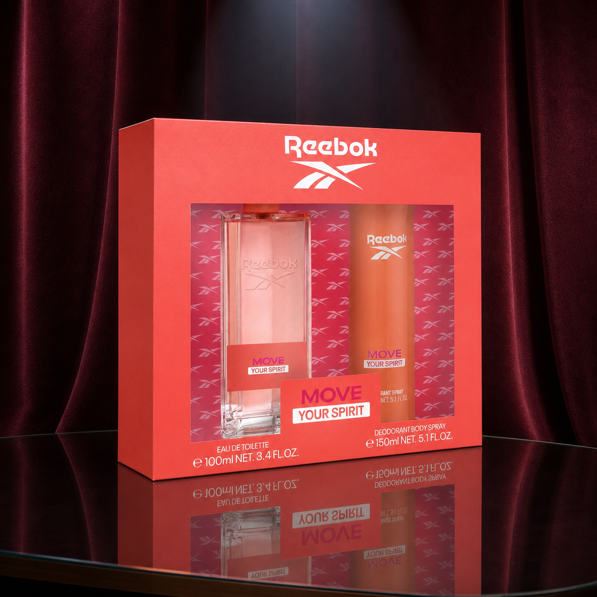 Reebok Move Your Spirit Women EDT 100ml and body spray 150ml gift set in a burgundy mirrored setting