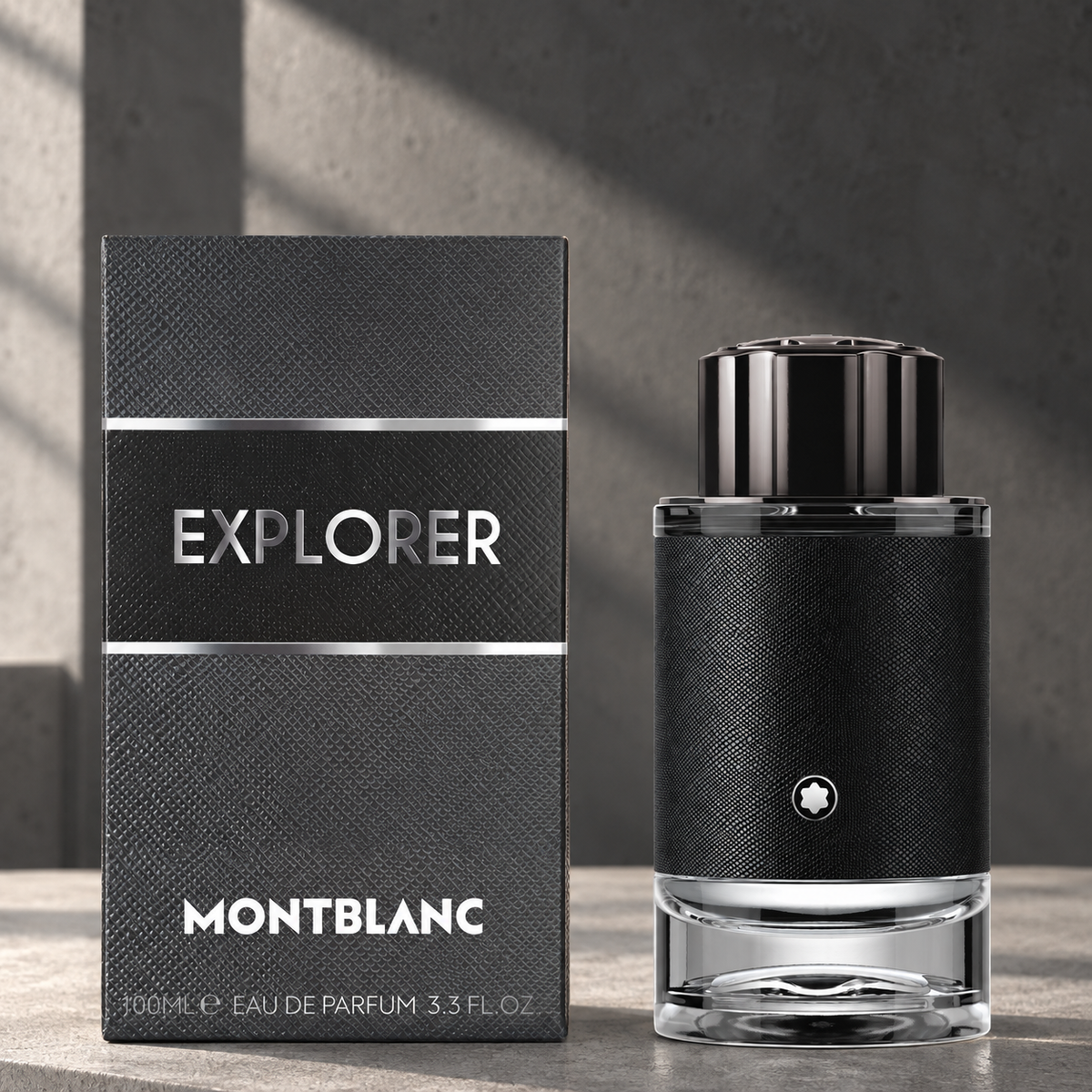 Montblanc Explorer Eau de Parfum 100ml bottle and box in a concrete gallery