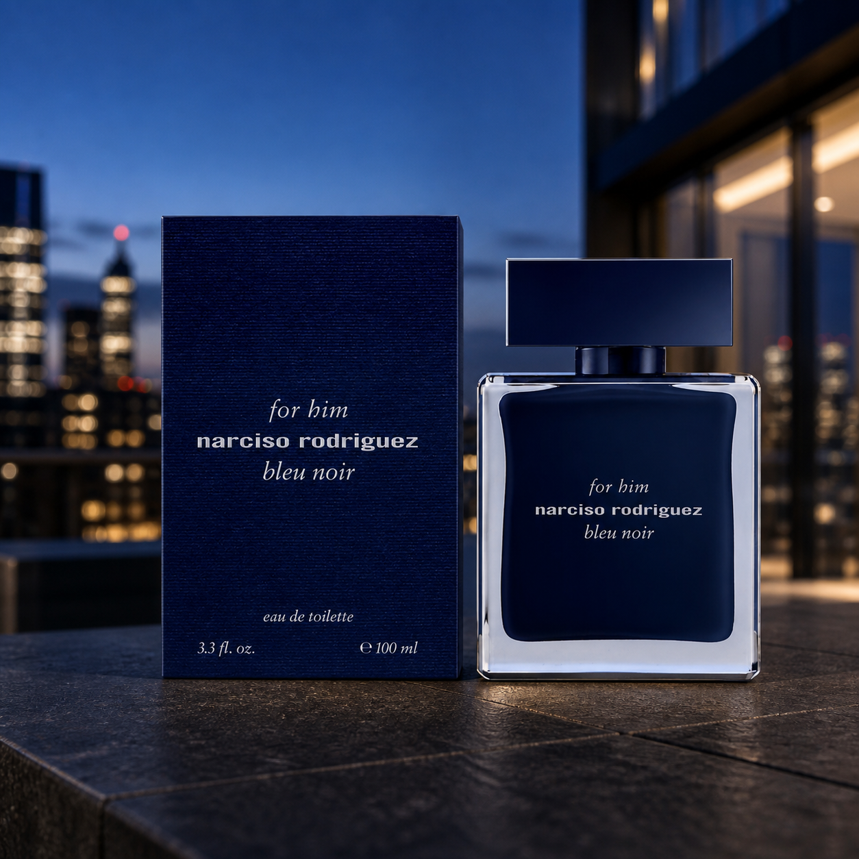 Narciso Rodriguez For Him Bleu Noir Eau de Toilette 100ml bottle and box on a city terrace at dusk