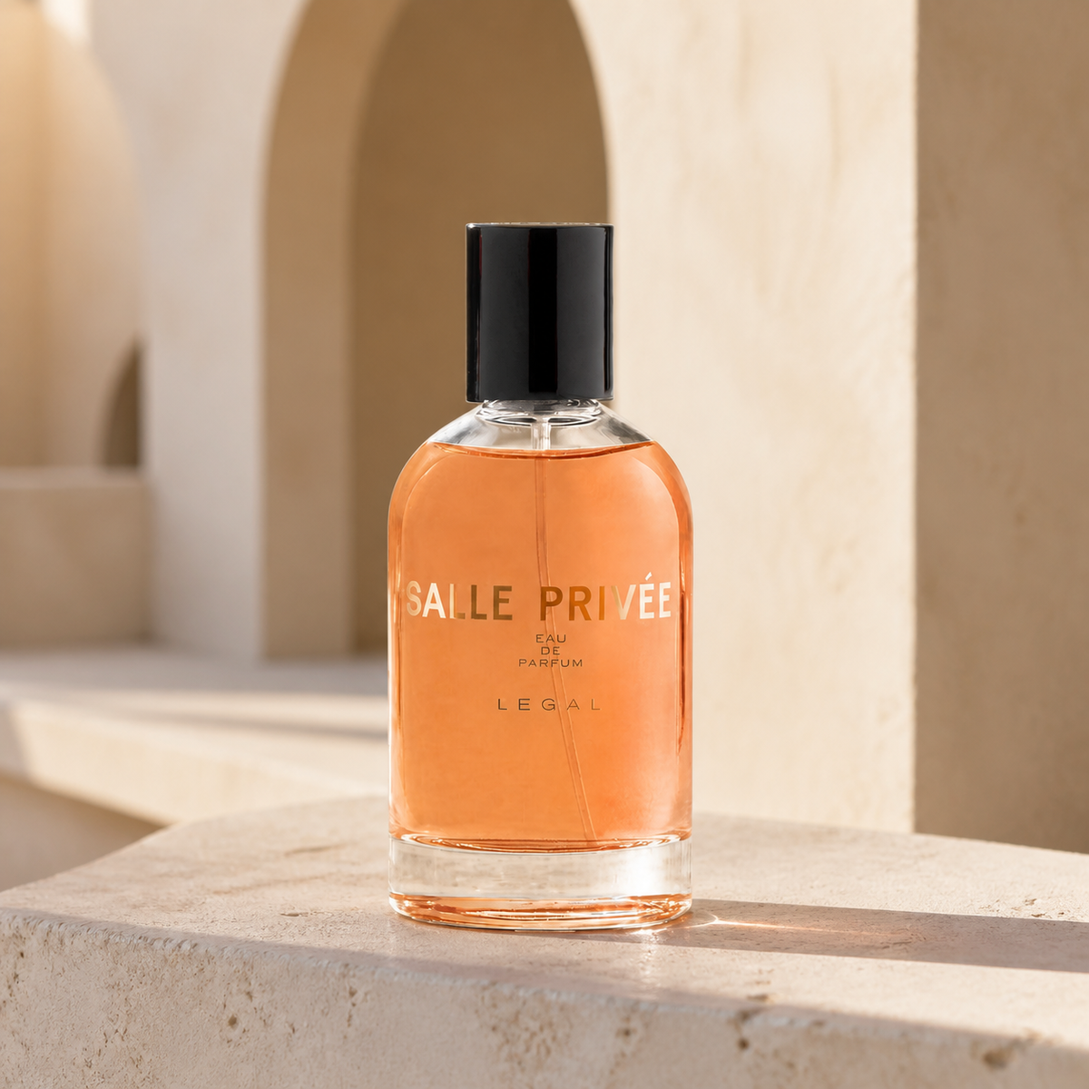 Salle Privée Legal Eau de Parfum 100ml bottle on sunlit limestone