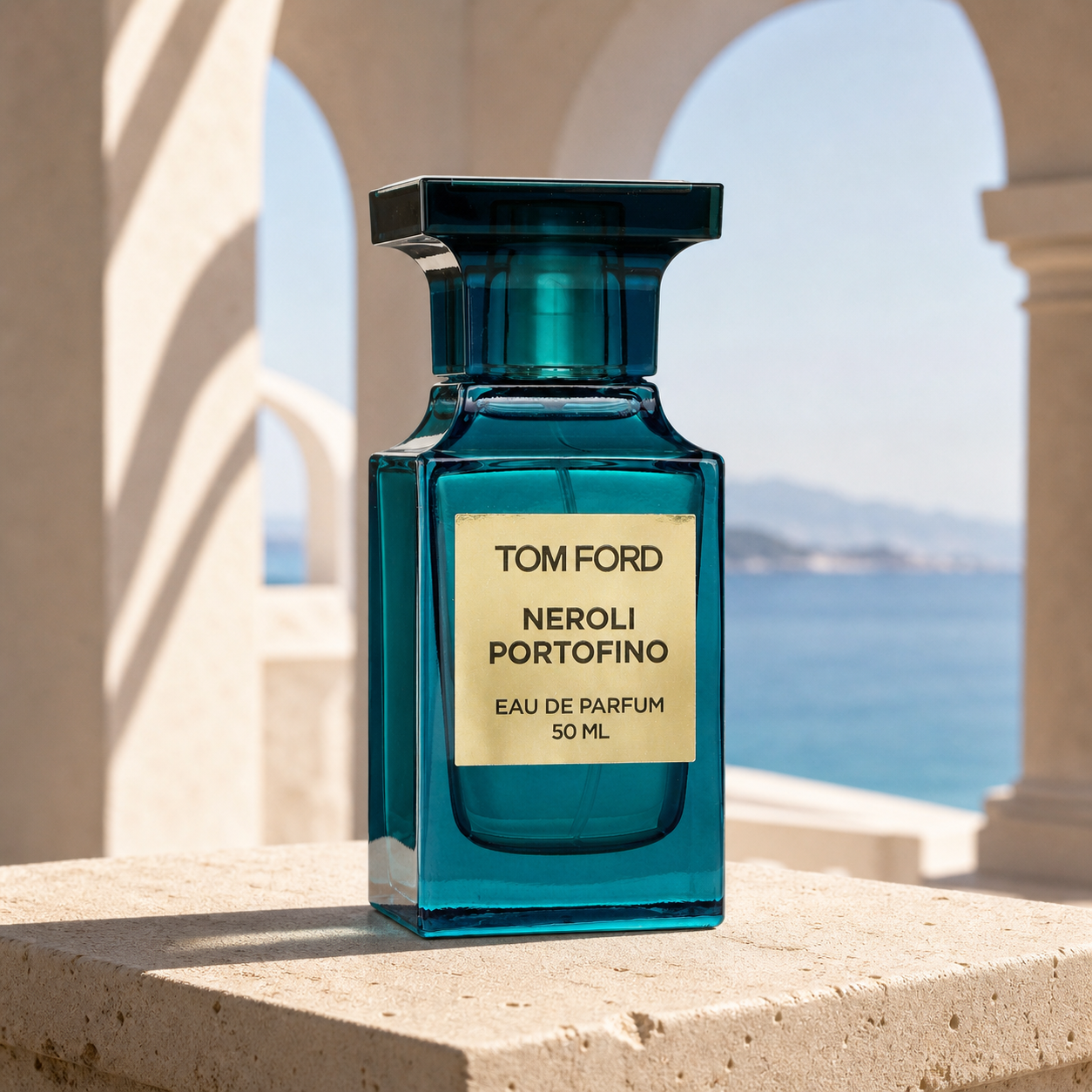 Tom Ford Neroli Portofino Eau de Parfum 50ml bottle in a Mediterranean courtyard