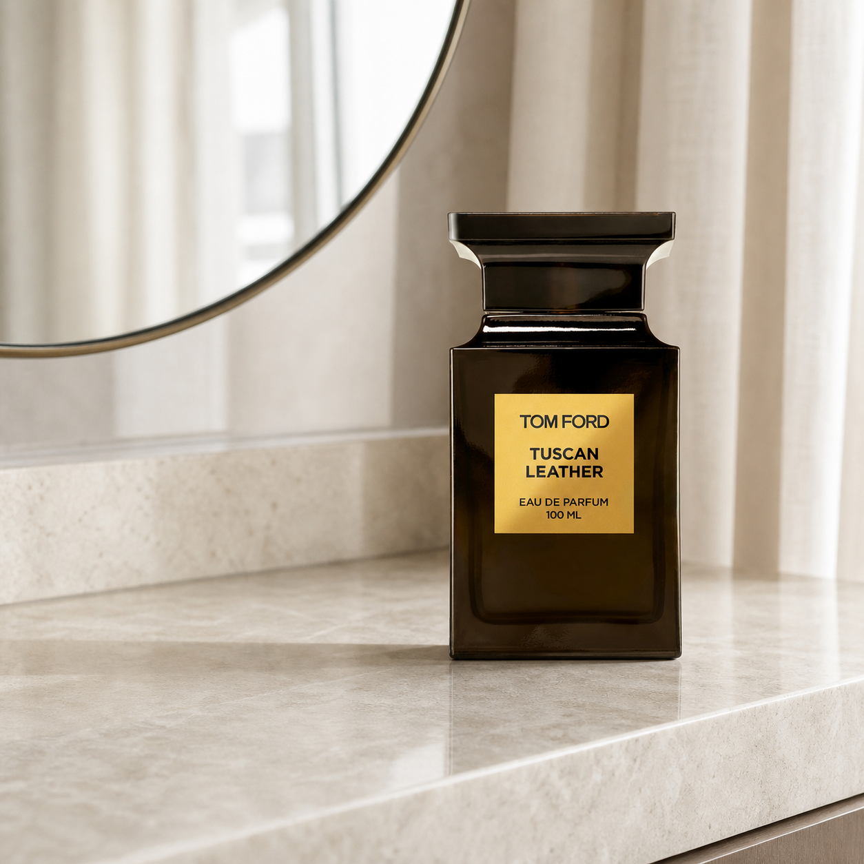 Tom Ford Tuscan Leather Eau de Parfum 100ml bottle in a modern dressing area