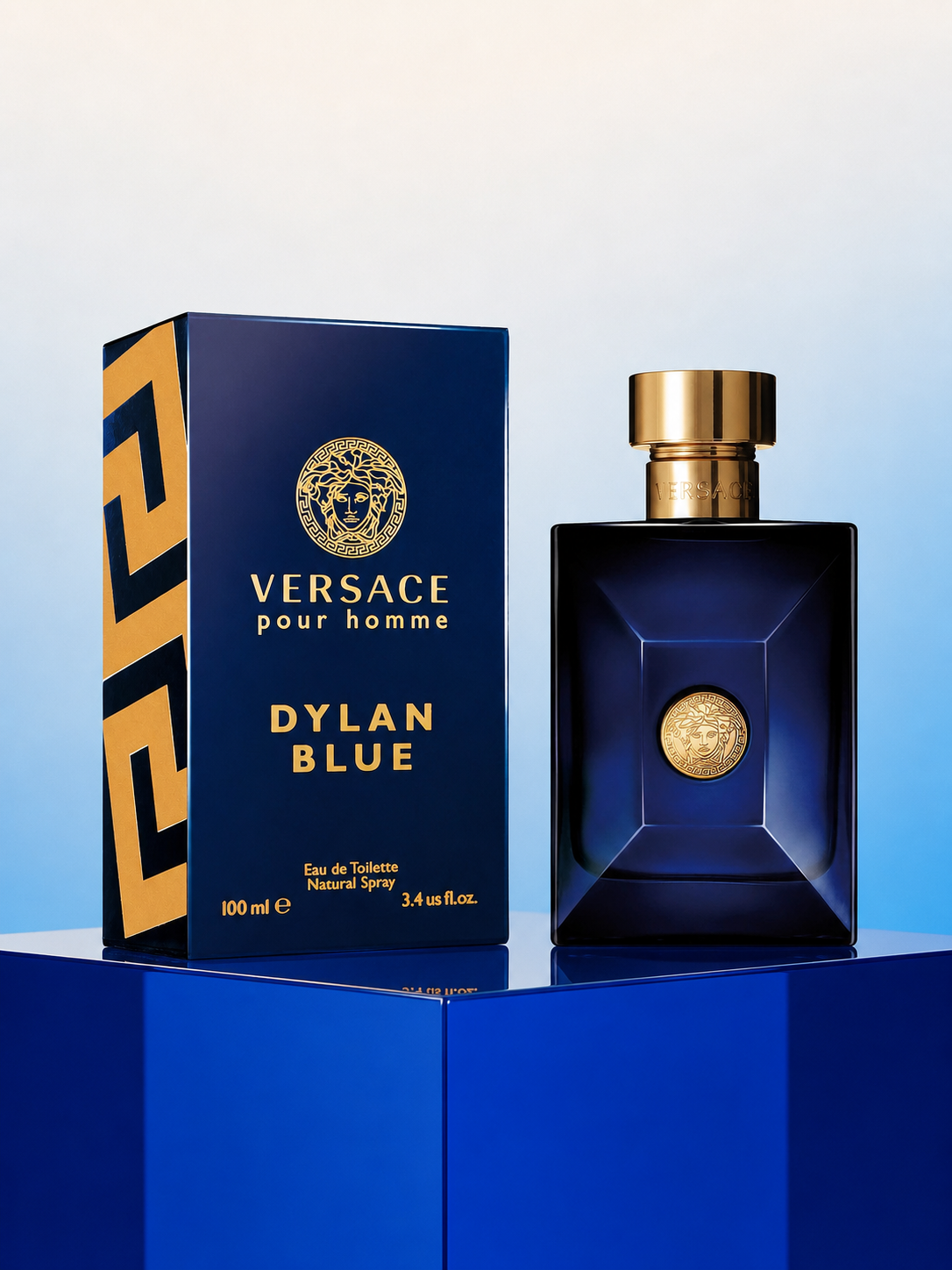 Versace Dylan Blue Eau de Toilette 100ml bottle and box on a cobalt pedestal